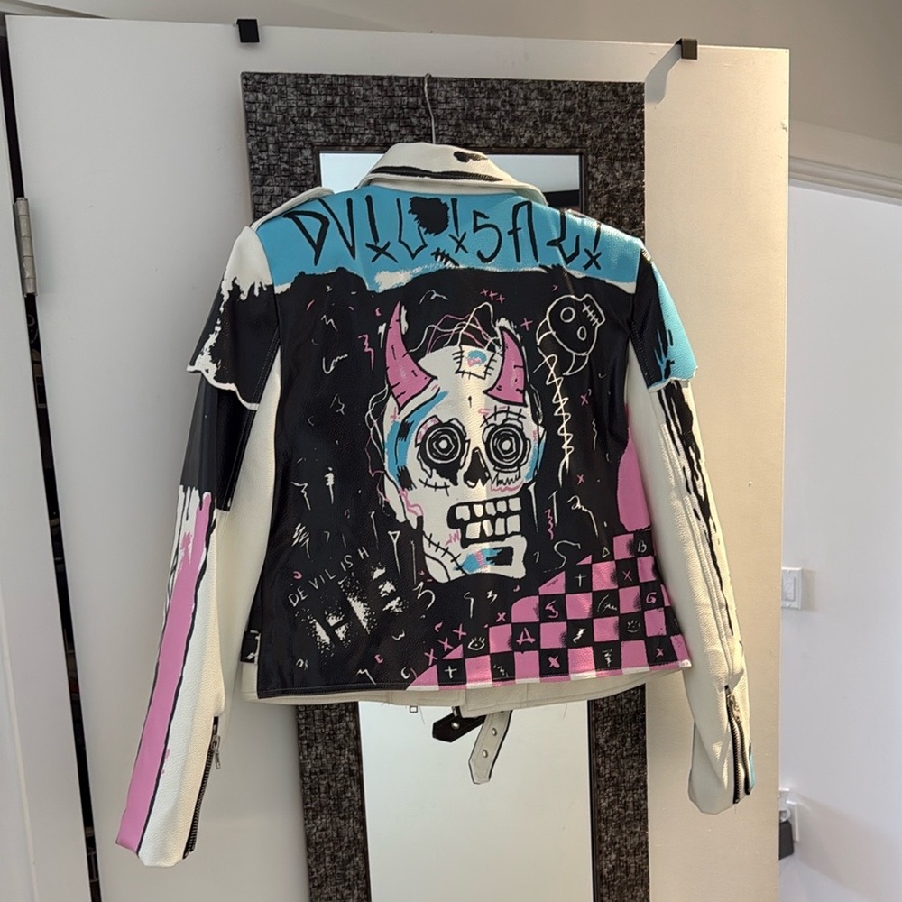 Edgy Black and Pink Leather Jacket with Skull Graphic